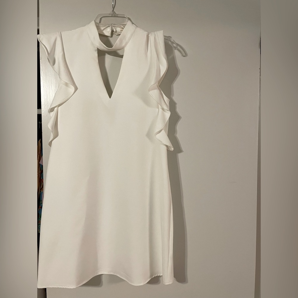 White mini dress with flutter sleeves